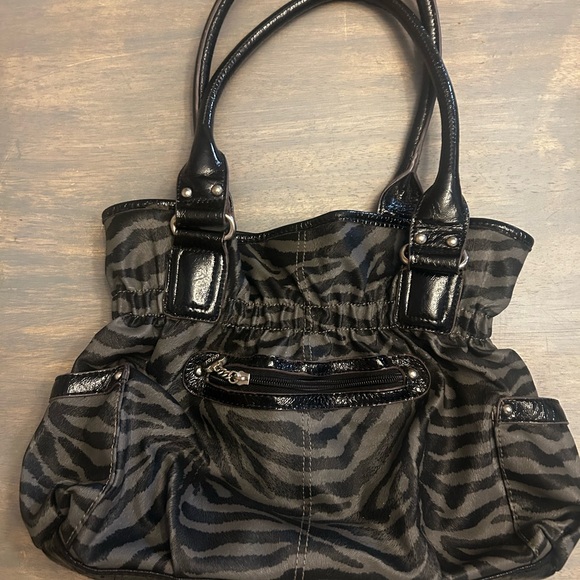 Kathy Van Zeeland Black Shoulder Bag with Zebra Print - Picture 2 of 3